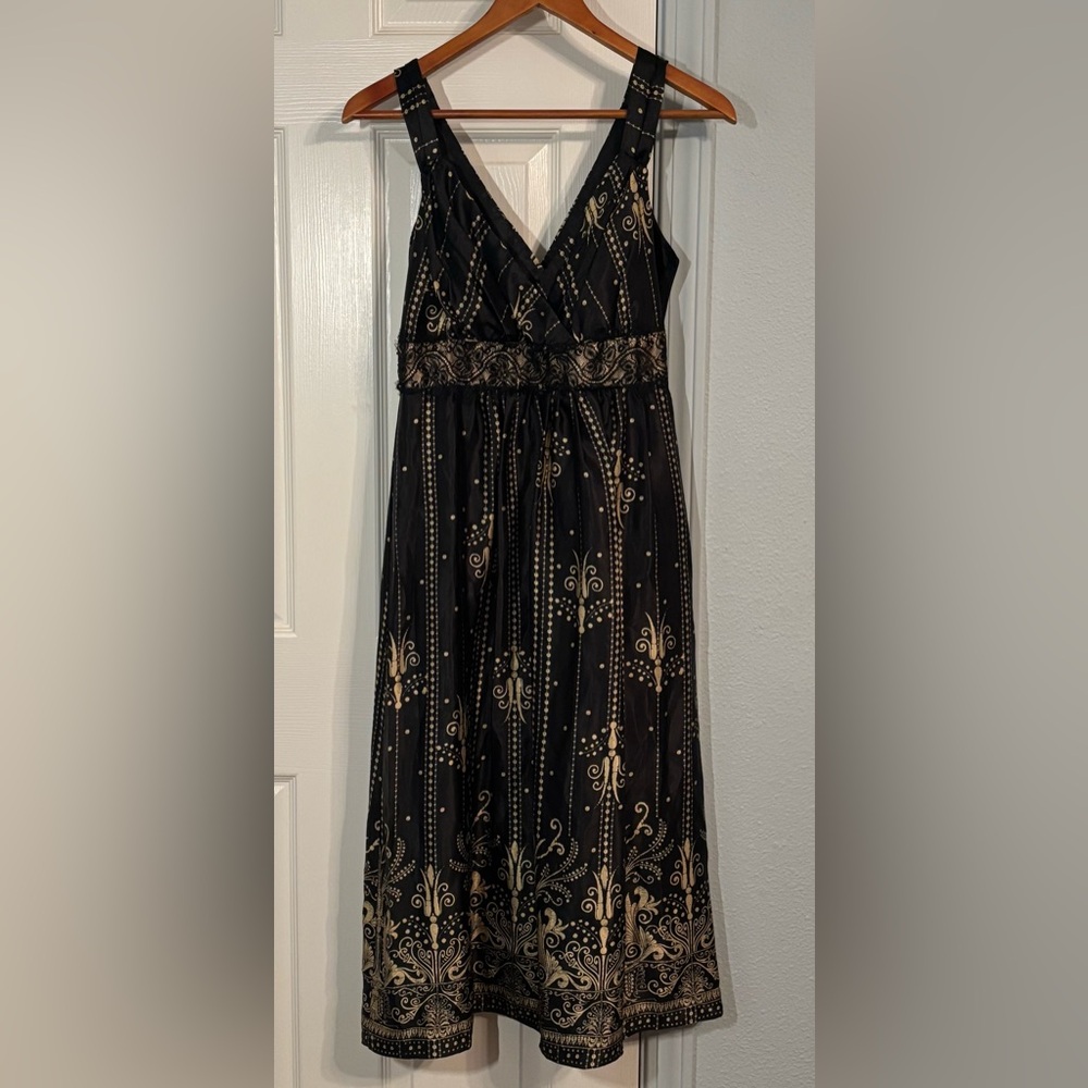 Elegant brown and gold plunging V-neck silk dress